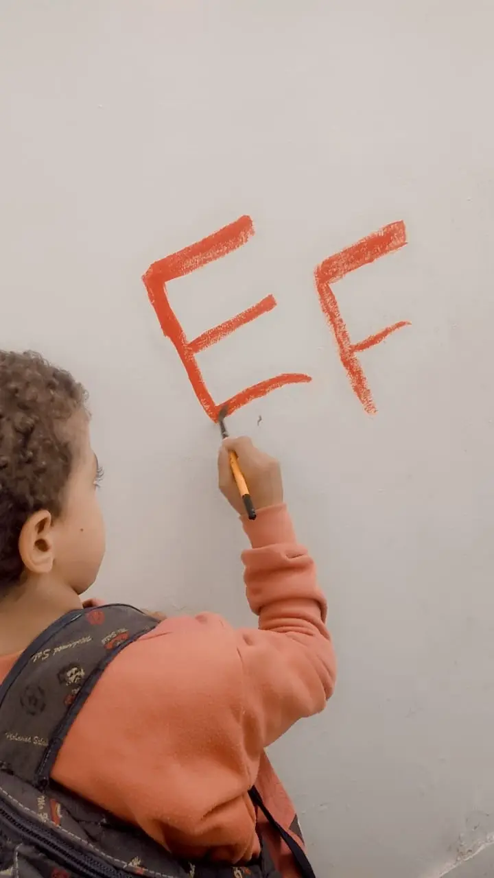 Photograph 2 from: Teaching young children to replace random scribbling with decorating the wall with attract